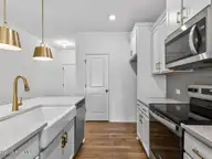 38 N District Avenue, Clayton, NC 27527 — 3-bedroom home in Flowers Plantation, Clayton, NC, photo 8 of 38: 009-1280x960-kitchen