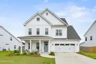 424 Northern Pintail Place, Hampstead, NC 28443 — 4-bedroom home in Magnolia Reserve, Hampstead, NC, photo 1 of 68: 1_front exterior