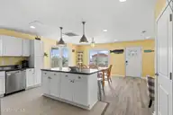 1414 E Beach Drive, Oak Island, NC 28465 — 3-bedroom waterfront home, Oak Island, NC, photo 16 of 55: 17-web-or-mls-CAMMediaLLC.com (17 of 55)