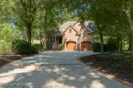 400 Wild Dunes Circle, Wilmington, NC 28411 — 4-bedroom waterfront home in Porters Neck Plantation, Wilmington, NC, photo 1 of 70: exteriorupdated