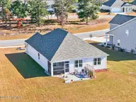 1271 Rippling Cove Loop SW, Supply, NC 28462 — 3-bedroom waterfront home in Stanbury Creek, Supply, NC, photo 4 of 53: Rear