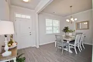271 Jones Ridge Lane Lot 51, Newport, NC 28570 — 4-bedroom home in Ballantine Grove, Newport, NC, photo 3 of 44: Front Door and Dining Room