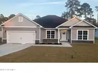 1306 Caracara Drive Model Home, New Bern, NC 28560 — 4-bedroom waterfront home in Fairfield Harbour, New Bern, NC, photo 1 of 24: House Front