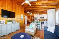 1914 E Beach Drive, Oak Island, NC 28465 — 3-bedroom waterfront home, Oak Island, NC, photo 8 of 69: shniderproductions.com-33