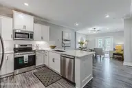 395 S Crow Creek Dr 1702, Calabash, NC 28467 — 3-bedroom condo in Crow Creek, Calabash, NC, photo 7 of 39: Kitchen/Dining/Living,