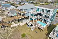 4005 E Beach Drive, Oak Island, NC 28465 — 7-bedroom waterfront home in E. Long Beach, Oak Island, NC, photo 6 of 65: Affinity 6