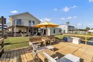 126 Dolphin Bay Estates, Cedar Point, NC 28584 — 3-bedroom waterfront home in Dolphin Bay Estates, Cedar Point, NC, photo 3 of 29: 03_beyc6ab2a76813d54