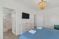 2205 E Beach Drive, Oak Island, NC 28465 — 6-bedroom waterfront home in Long Beach, Oak Island, NC, photo 18 of 55