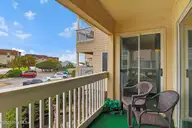 1904 E Fort Macon Road 156, Atlantic Beach, NC 28512 — 2-bedroom waterfront condo in APATB, Atlantic Beach, NC, photo 21 of 54: Covered Balcony