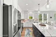 210 River Oats Court, Holly Ridge, NC 28445 — 4-bedroom waterfront home in Redd's Cove, Holly Ridge, NC, photo 10 of 69: 36_kitchen