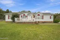 7133 Roebuck Lane NE, Leland, NC 28451 — 3-bedroom manufactured home in Hunters Ridge, Leland, NC, photo 1 of 44: 1_img_0820