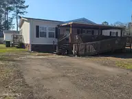 1135 Stone Chimney Road SW, Supply, NC 28462 — 3-bedroom manufactured home in Edgarwood, Supply, NC, photo 1 of 28