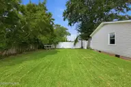 211 Vine Street, Beaufort, NC 28516 — 3-bedroom home in Jones Village, Beaufort, NC, photo 6 of 36: Large Fenced Yard