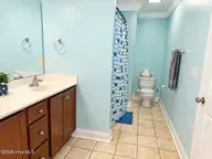 776 Jim Grant Avenue, Sneads Ferry, NC 28460 — 3-bedroom home in Grantwood, Sneads Ferry, NC, photo 15 of 20: JG master bath