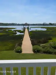 325 Anson Road, Beaufort, NC 28516 — 4-bedroom waterfront home in Wards Creek Point, Beaufort, NC, photo 3 of 48: ChatGPT Image Aug 19, 2026, 08_28_44 AM