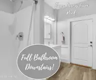 804 E Oak Island Drive, Oak Island, NC 28465 — 3-bedroom home, Oak Island, NC, photo 6 of 64: 804 E OAK ISLAND DR DOWNSTAIRS BATHROOM