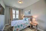 124 Salt Marsh Way, Atlantic Beach, NC 28512 — 4-bedroom waterfront home in Salt Marsh Villas, Atlantic Beach, NC, photo 12 of 32: Pink14