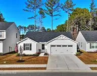 1521 Spring Meadow Drive, Shallotte, NC 28470 — 3-bedroom home in Sharron Creek Crossing, Shallotte, NC, photo 2 of 28: Drone209
