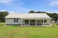 107 Fodder Drive, Hubert, NC 28539 — 3-bedroom home in Ole Mill Village, Hubert, NC, photo 5 of 59: 05_Rear_Covered_Patio