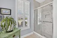 1230 Nightingale Court, Leland, NC 28451 — 3-bedroom waterfront home in Waterford of the Carolinas, Leland, NC, photo 24 of 75: Primary Bathroom