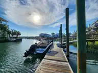 312 Causeway Drive Unit A, Wrightsville Beach, NC 28480 — 3-bedroom waterfront condo, Wrightsville Beach, NC, photo 10 of 65: View from Dock to Motts Channel