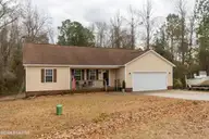 206 Hominy Court, Hubert, NC 28539 — 3-bedroom home in Ole Mill Village, Hubert, NC, photo 2 of 27: Front