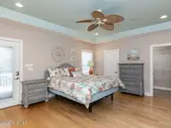 129 Sunset Drive, Cedar Point, NC 28584 — 3-bedroom waterfront home in Plantation Shores, Cedar Point, NC, photo 13 of 46: 014-1280x960-master-bedroom