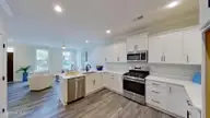 3907 Reunion Pointe Lane, New Bern, NC 28562 — 3-bedroom townhome in Carolina Colours, New Bern, NC, photo 3 of 37: 27-web-or-mls-3907-Reunion-Pointe-Ln-New