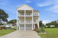 450 Pearson Circle, Newport, NC 28570 — 4-bedroom waterfront home in Broad Creek Woods, Newport, NC, photo 1 of 70: 1-web-or-mls-IMG_6898