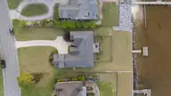 405 Neuse Harbour Boulevard, New Bern, NC 28560 — 4-bedroom waterfront home in Neuse Harbour, New Bern, NC, photo 5 of 52: 12-web-or-mls-DJI_20260414192358_0791_D