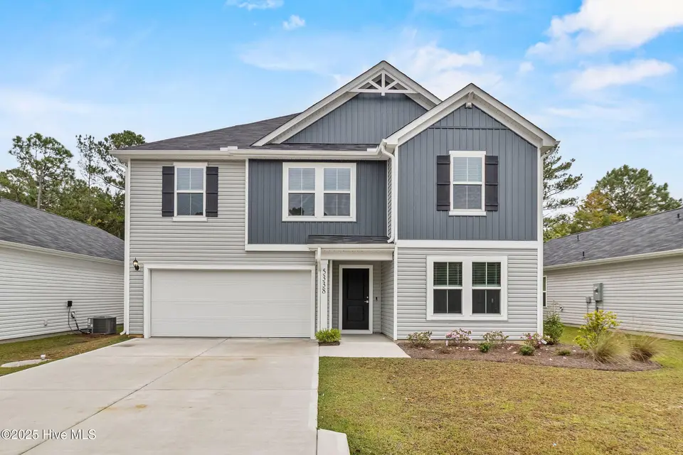 5338 Meagan Lane NE, Winnabow, NC 28479 — 4-bedroom home in Country Walk, Winnabow, NC, photo 1 of 55: 1_front exterior