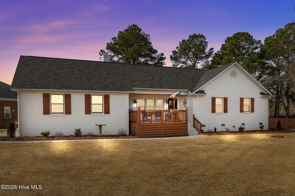 100 Stevens Court, Swansboro, NC 28584 — 3-bedroom waterfront home in River Reach, Swansboro, NC, photo 1 of 56: Flag Photo