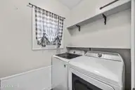 1003 Humphrey Road, Jacksonville, NC 28540 — 4-bedroom home in Georges Corner, Jacksonville, NC, photo 17 of 28: 1003 Humphrey Road Laundry