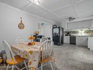 87 Crown Point Road, Hubert, NC 28539 — 3-bedroom home in Crown Point, Hubert, NC, photo 9 of 21: Dining - Kitchen