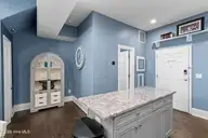 21 N Front Street Unit 3d1, Wilmington, NC 28401 — 1-bedroom condo in Downtown, Wilmington, NC, photo 8 of 41: Kitchen Island:Closet