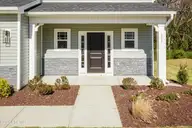 400 Whitetail Way, Tabor City, NC 28463 — 4-bedroom home in Deerfield, Tabor City, NC, photo 5 of 39: Porch 01