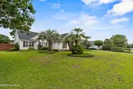 4809 W Grove Drive, Wilmington, NC 28409 — 4-bedroom home in Masonboro Woods, Wilmington, NC, photo 2 of 40: Front Exterior (6)