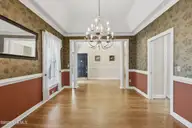 209 Small Drive, Elizabeth City, NC 27909 — 3-bedroom waterfront home in Newbegun Land, Elizabeth City, NC, photo 5 of 39: 209 Small view of DR toward foyer