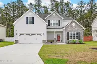 222 Wood House Drive, Jacksonville, NC 28546 — 4-bedroom home in Stateside, Jacksonville, NC, photo 1 of 51: Front
