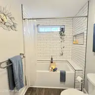 117 Halls Creek Drive, Swansboro, NC 28584 — 4-bedroom waterfront home in Halls Creek At The Hammocks, Swansboro, NC, photo 24 of 38: master bath 1