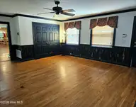 715 Evergreen Road, Rocky Mount, NC 27803 — 4-bedroom home in West Haven, Rocky Mount, NC, photo 21 of 42: Evergreen Den View 2