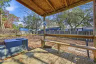 2186 Forest Drive SW, Supply, NC 28462 — 2-bedroom manufactured home in Forest Hills, Supply, NC, photo 18 of 26: outside backdoor