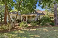 1623 Amberwood Drive SE, Bolivia, NC 28422 — 4-bedroom waterfront home in Winding River Plantation, Bolivia, NC, photo 1 of 76