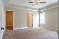 103 Laurel Oak Lane, Pinebluff, NC 28373 — 4-bedroom home in The Pines, Pinebluff, NC, photo 12 of 34: Primary Suite