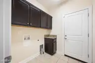 26 Cypress Circle, Southern Pines, NC 28387 — 3-bedroom townhome in Cypress Creek, Southern Pines, NC, photo 17 of 28: 26 cypress laundry