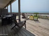 1103 Ocean Drive E & W, Emerald Isle, NC 28594 — 6-bedroom waterfront home, Emerald Isle, NC, photo 8 of 65: 26 seating on deck