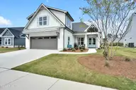7374 Foxbriar Drive, Leland, NC 28451 — 4-bedroom home in Brunswick Forest, Leland, NC, photo 1 of 55