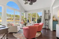 7568 Dunbar Drive SW, Sunset Beach, NC 28468 — 3-bedroom waterfront home in Sandpiper Bay, Sunset Beach, NC, photo 17 of 51: Windows, windows, windows!