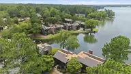 250 Sugar Gum Lane # 214, Pinehurst, NC 28374 — 2-bedroom waterfront condo in Lakeview Condos, Pinehurst, NC, photo 4 of 58: 6-web-or-mls-DJI_20260729133138_0051_D