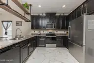 101 Boysenberry Fields Road, Maple Hill, NC 28454 — 3-bedroom home in Strawberry Fields, Maple Hill, NC, photo 21 of 43: 21KITCHEN